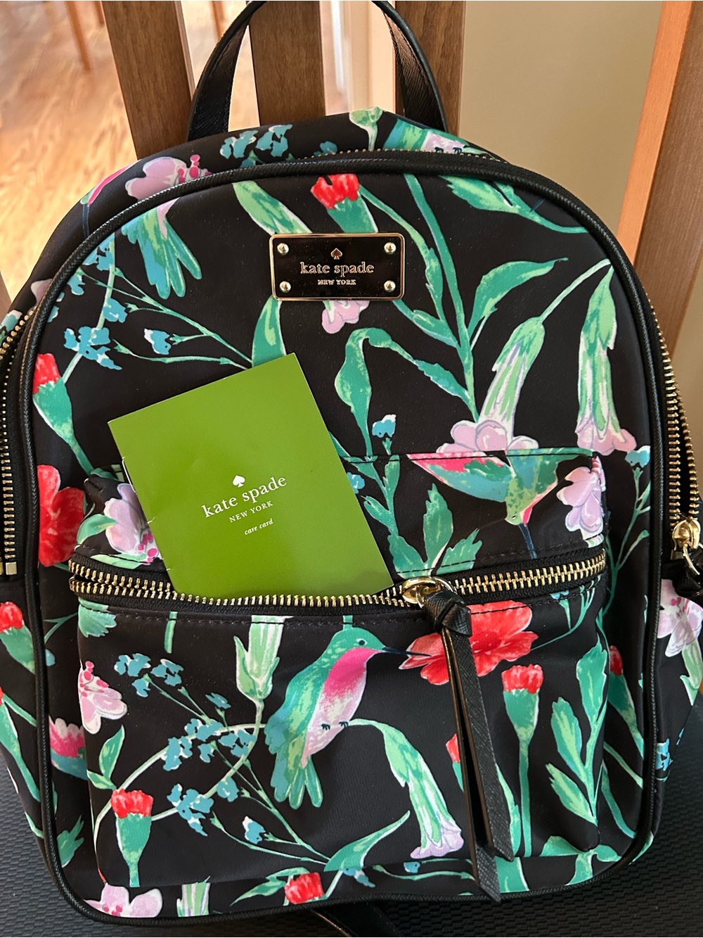 kate spade Black Floral & Hummingbird Mini Backpack with Pink and Green Accents